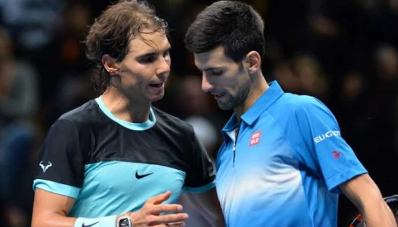 Rafael Nadal (L) and Novak Djokovic. — AFP