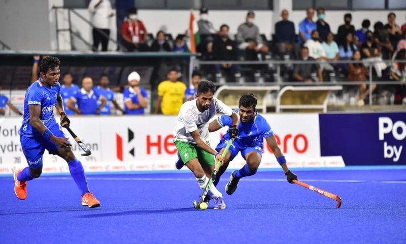 Pakistani and Indian players complete in an Asia Cup 22 match in Jakarta, Indonesia, May 23. — Pakistan Hockey Federation