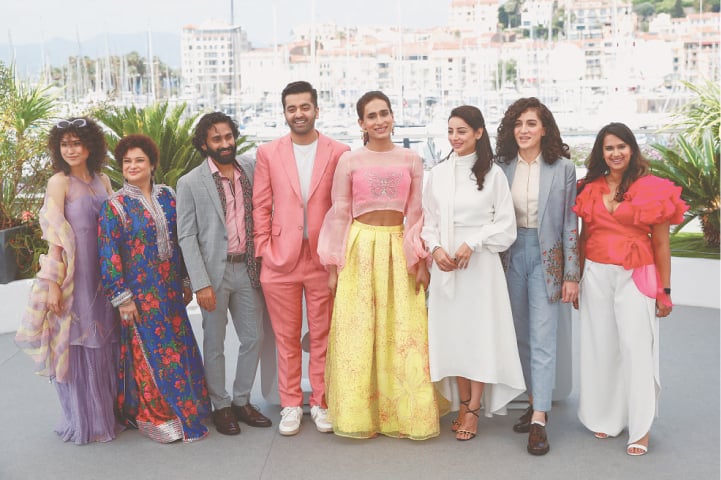 CANNES (France): Joyland director Saim Sadiq and cast members Alina Khan, Ali Junejo, Sarwat Gilani, Sania Saeed, Rasti Farooq and producers Apoorva Guru Charan and Sana Jafri pose during a photo call.—Reuters