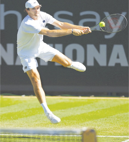 TOMMY Paul of the US returns a shot to Italy’s Jannik Sinner during their second-round match of the Eastbourne International at the Devonshire Park Lawn Tennis Club.—Reuters