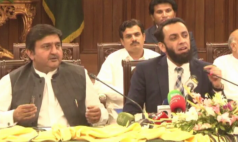 Punjab Law Minister Malik Ahmad Khan (L) and Punjab government spokesperson Attaullah Tarar (R) address a press conference on Friday. — DawnNewsTV