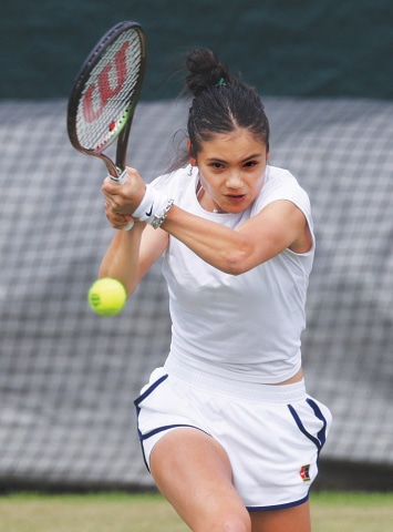 BRITAIN’S Emma Raducanu practises at the All England Lawn Tennis and Croquet Club on Saturday.—Reuters