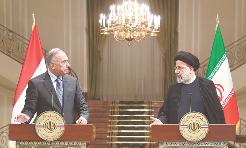 Tehran: Iran’s President Ebrahim Raisi (right) speaking at a joint press conference with Iraqi Prime Minister Mustafa al-Kadhemi on Sunday.—AFP