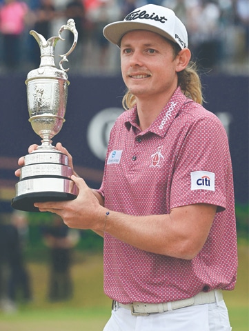 ST ANDREWS: Australia&rsquo;s Cameron Smith poses with the Claret Jug, the trophy for the champion golfer of the year, after winning the British Open on The Old Course on Sunday.&mdash;AFP