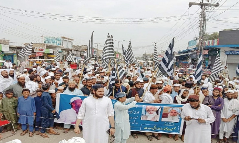 JUI-F activists stage a protest demonstration in Lakki Marwat on Sunday. — Dawn JUI-F activists stage a protest demonstration in Lakki Marwat on Sunday. — Dawn