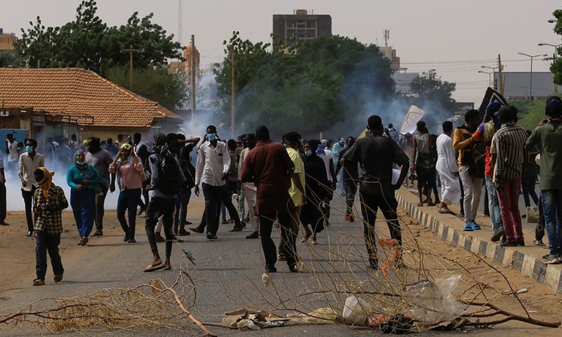 Protesters march during a rally against military rule following the last coup, in Khartoum, Sudan on July 31, 2022. — Reuters Protesters march during a rally against military rule following the last coup, in Khartoum, Sudan on July 31, 2022. — Reuters