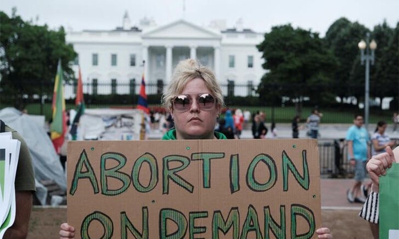 A Women's March activist attends a protest in the wake of the U.S. Supreme Court's decision to overturn the landmark Roe v. Wade abortion decision, in Washington, D.C. on July 9, 2022. — Reuters/File A Women's March activist attends a protest in the wake of the U.S. Supreme Court's decision to overturn the landmark Roe v. Wade abortion decision, in Washington, D.C. on July 9, 2022. — Reuters/File