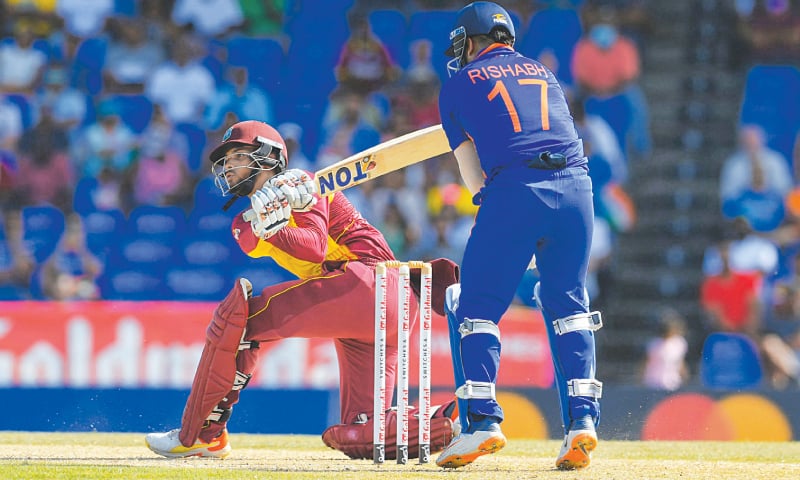 WEST Indies opener Brandon King hits a boundary during the second T20 International against India at the Warner Park.&mdash;AFP