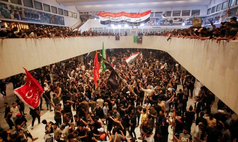 Supporters of Iraqi cleric Moqtada Sadr gather during a sit-in at the parliament building in Baghdad on July 31. — Reuters Supporters of Iraqi cleric Moqtada Sadr gather during a sit-in at the parliament building in Baghdad on July 31. — Reuters