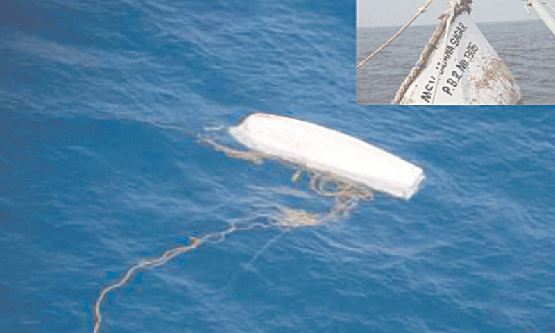 A photo released by Pakistan Navy shows the capsized Indian vessel, Jamna Sagar, in the Arabian Sea near Gwadar. A photo released by Pakistan Navy shows the capsized Indian vessel, Jamna Sagar, in the Arabian Sea near Gwadar.