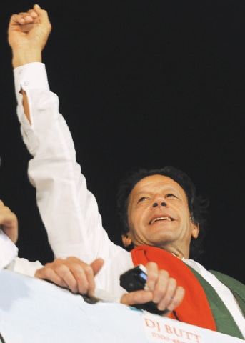 Imran Khan hurls challenges from his container rostrum against the PMLN government during his protest in Islamabad in 2014. (Courtesy: White Star Photo) - Photo: Tanveer Shahzad