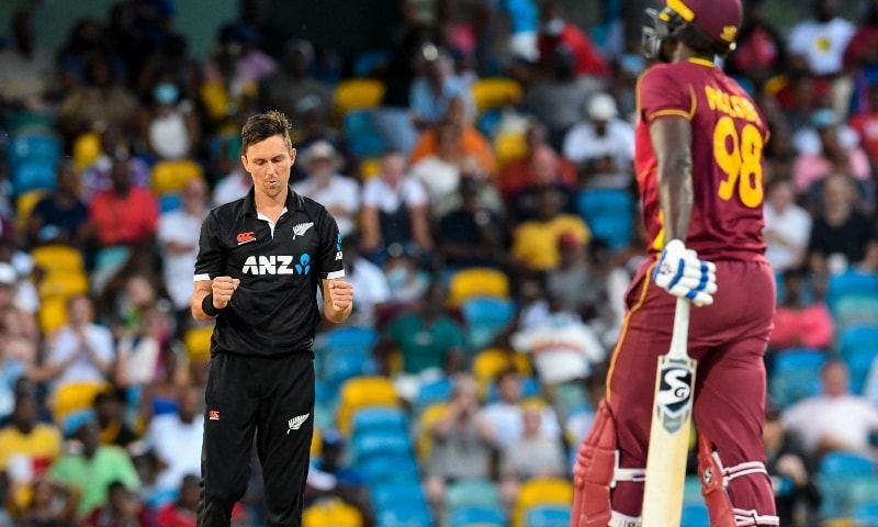 Trent Boult (L) of New Zealand celebrates the dismissal of Jason Holder (R) of West Indies during the 3rd and final ODI match between West Indies and New Zealand at Kensington Oval, Bridgetown, Barbados, on August 21. &mdash; AFP