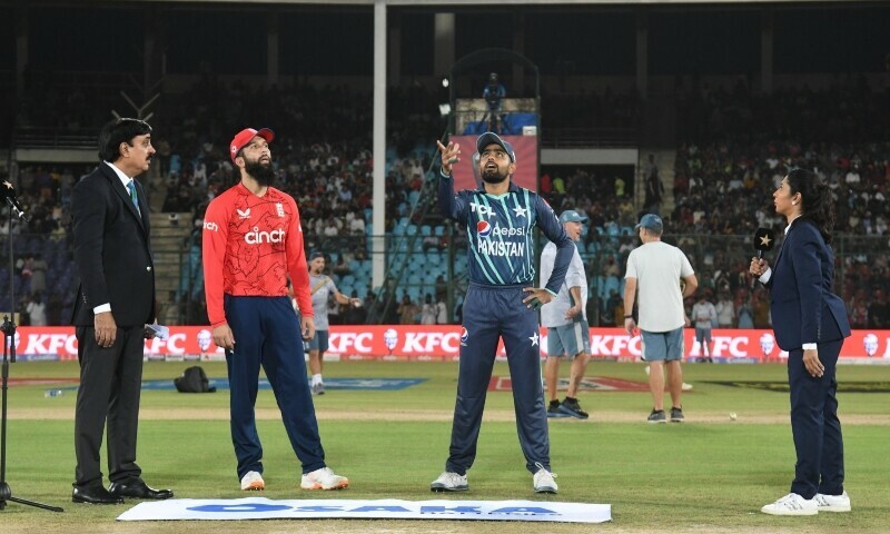 <p>England captain Moeen Ali and Pakistan captain Babab Azam at the toss for the second Pakistan-England Twenty20 international at the National Stadium in Karachi on Thursday. — Pakistan Cricket Twitter</p>