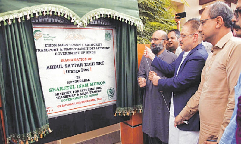 Renowned social worker Faisal Edhi, Sindh Information Minister Sharjeel Memon and Labour Minister Saeed Ghani inaugurate the Orange Line BRT service, which has been named the Abdul Sattar Edhi Line, on Saturday.—PPI