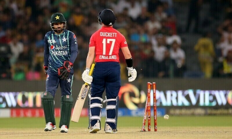 Mohammad Rizwan (R) takes the wicket of England’s Ben Duckett during the seventh Twenty20 international cricket match between Pakistan and England at the Gaddafi Cricket Stadium in Lahore on October 2. — Pakistan Cricket Twitter