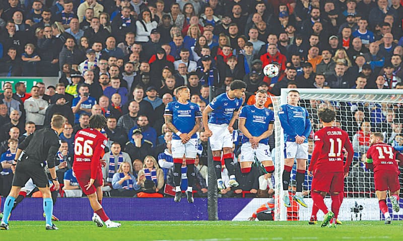 ANFIELD: Liverpool’s Trent Alexander-Arnold (second L) shoots to score from a free kick during the Champions League Group ‘A’ match against Rangers at Anfield.—AFP