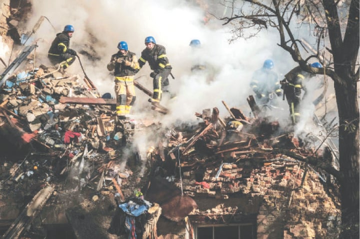 KYIV was struck four times in early morning attack with ‘kamikaze drones’ that damaged a building and targeted a train station.—AFP