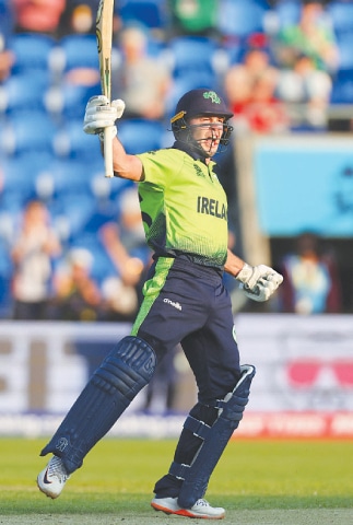 HOBART: Ireland batter Curtis Campher celebrates after scoring the winning runs against Scotland during their ICC T20 World Cup match at Bellerive Oval on Wednesday.&mdash;AFP