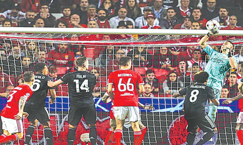 LISBON: Benfica goalkeeper Odisseas Vlachodimos makes a save next to Juventus’ Weston Mckennie during their Champions League Group ‘H’ match at the Luz Stadium.—AFP LISBON: Benfica goalkeeper Odisseas Vlachodimos makes a save next to Juventus’ Weston Mckennie during their Champions League Group ‘H’ match at the Luz Stadium.—AFP
