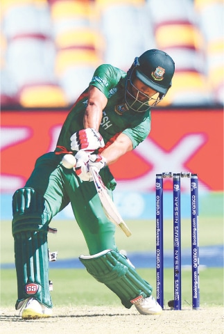 BRISBANE: Bangladesh opener Najmul Hossain plays a shot during the match against Zimbabwe at The Gabba on Sunday.&mdash;AFP