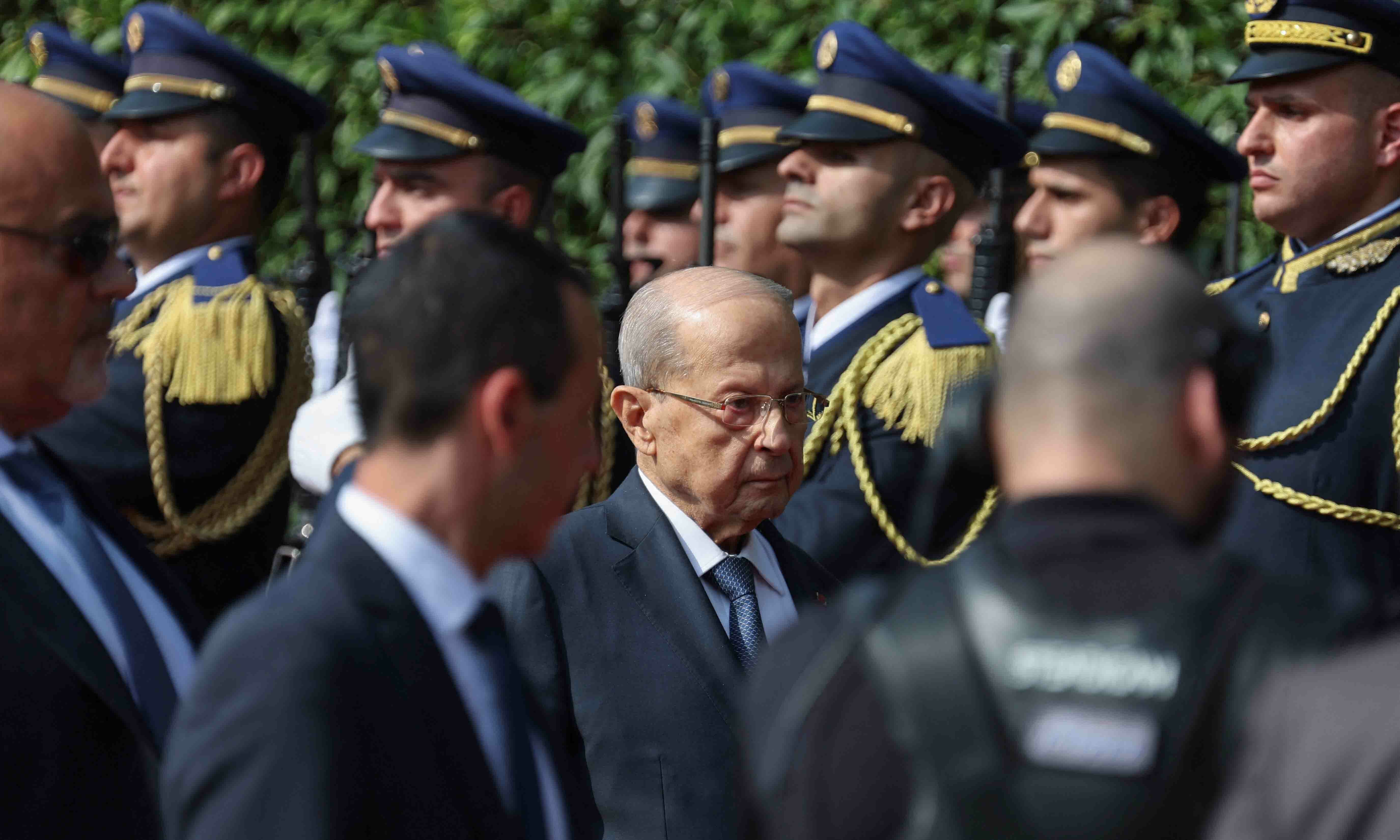 Lebanese outgoing President Michel Aoun reviews honor guards as he leaves the presidential palace a day before his six-year term officially ends, in Baabda, Lebanon, October 30. &mdash; Reuters