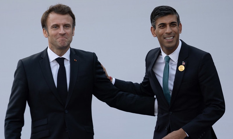 UK PM Rishi Sunak (R) photographed with French President Emmanuel Macron (L). &mdash; Photo courtesy Rishi Sunak's Twitter