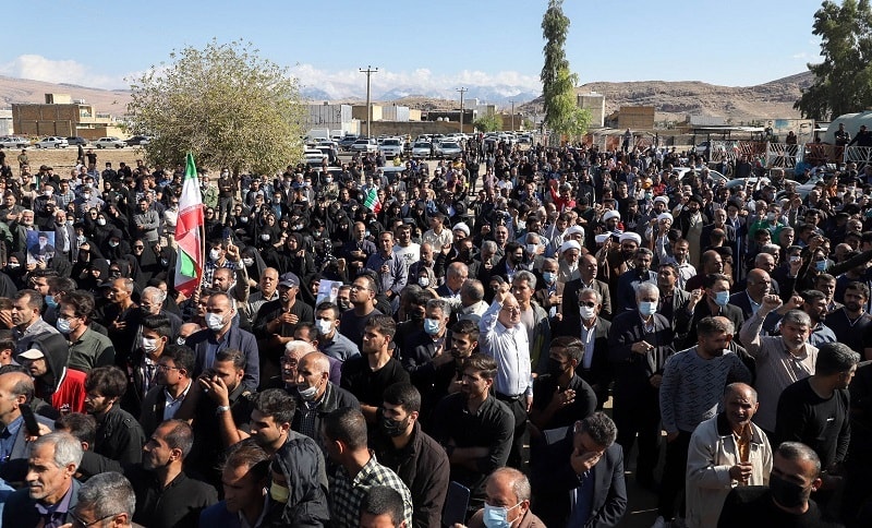 Iranians in the funeral procession of people killed in a shooting attack, in the city of Izeh in Iran's Khuzestan province, on November 18, 2022. — AFP