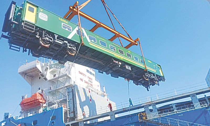 A PASSENGER coach is being offloaded at the Karachi Port on Sunday. Pakistan Railways has received a consignment of 46 high-speed coaches from China, paving the way for provision of modern travelling facilities 
to the masses.—Courtesy Pakistan Railways