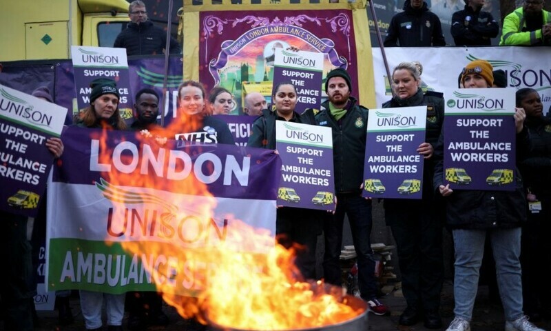 Ambulance workers take part in a strike, amid a dispute with the government over pay, outside NHS London Ambulance Service in London, Britain December 21, 2022. &mdash; Reuters