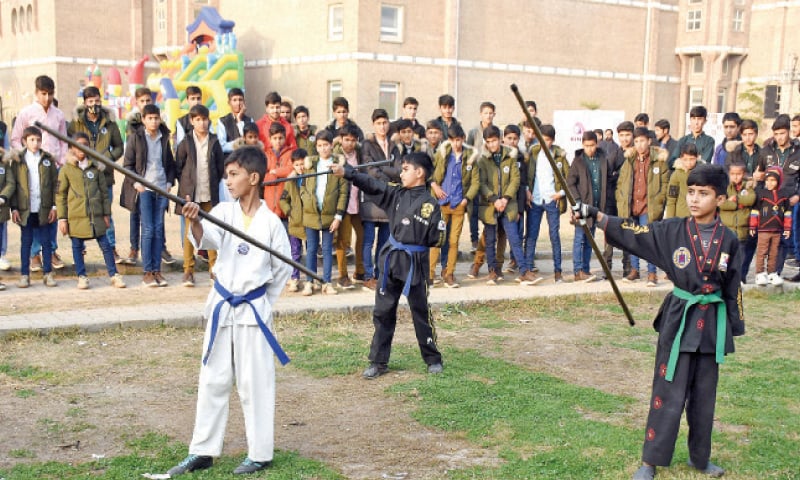 Children show their skills during a fundraiser for flood-affected people at the PNCA in Islamabad on Saturday. &mdash; Online