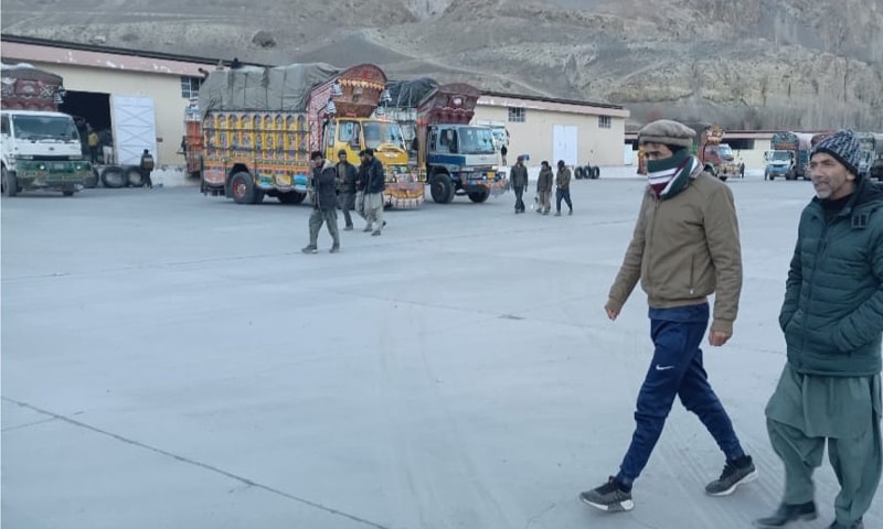 Trucks loaded with goods imported from China through Khunjerab Pass are ready to depart the Sost dry port.—Photo by the writer Trucks loaded with goods imported from China through Khunjerab Pass are ready to depart the Sost dry port.—Photo by the writer