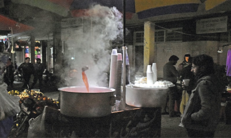 A vendor sells soup at Aabpara Market in Islamabad on Thursday. — Online A vendor sells soup at Aabpara Market in Islamabad on Thursday. — Online