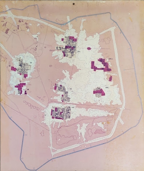 Site map of the excavated area of Mohenjo-Daro, displayed at the National Museum of Karachi. The city is believed to be much larger than depicted. The Citadel District is to the extreme left of the map, while the eastern area comprises the Lower City District. — Photo by author.