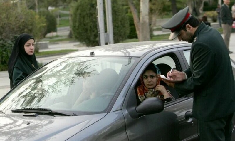 When Iran’s Nazer program was launched in 2020, car owners would be sent an SMS text message alerting them of a dress code violation in their vehicle and warning of ‘legal’ action if repeated. — AFP/File