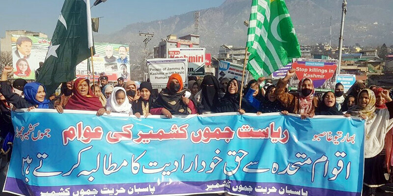 Female participants of a rally chant anti India and pro freedom slogans as they parade through a main road in Muzaffarabad to mark Right to Self Determination Day on Thursday.&mdash;Photo by author
