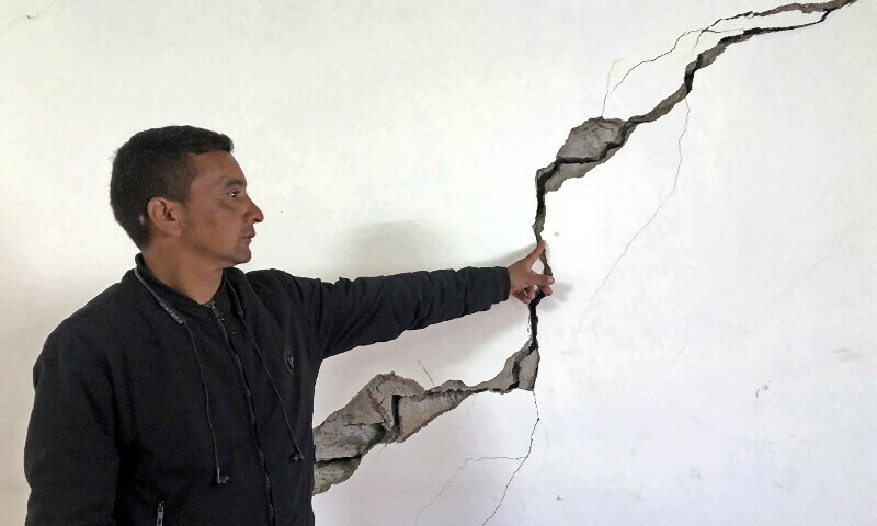 A resident shows a crack on the wall of his house at Joshimath in Chamoli district of India&rsquo;s Uttarakhand state on January 8. &mdash; AFP