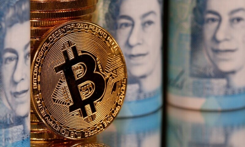 Representations of Bitcoin and pound banknotes are seen in this illustration taken January 6, 2020. — Reuters Representations of Bitcoin and pound banknotes are seen in this illustration taken January 6, 2020. — Reuters