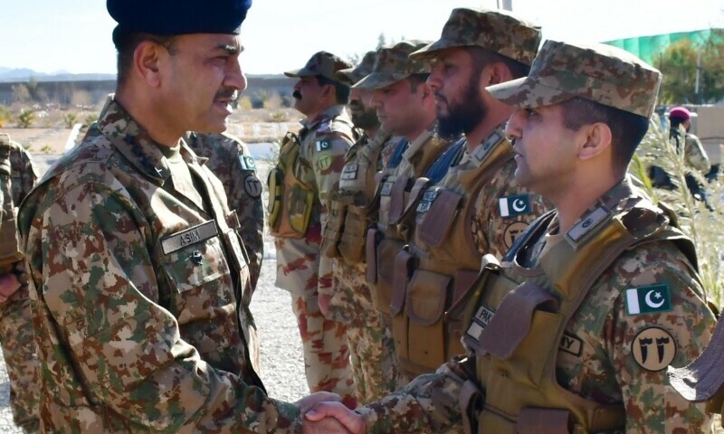 Chief of Army Staff General Asim Munir interacts with troops during a visit to Balochistan’s Khuzdar and Basima areas on Tuesday. — ISPR