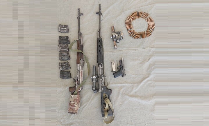 A cache of weapons recovered by forces from slain terrorists. — Photo via ISPR