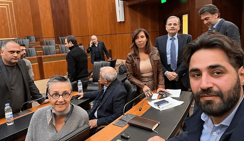 A handout picture released by Lebanese MP Firas Hamdan (R) on Jan 20 shows a group of Lebenese lawmakers sitting at the parliament in Beirut. — AFP