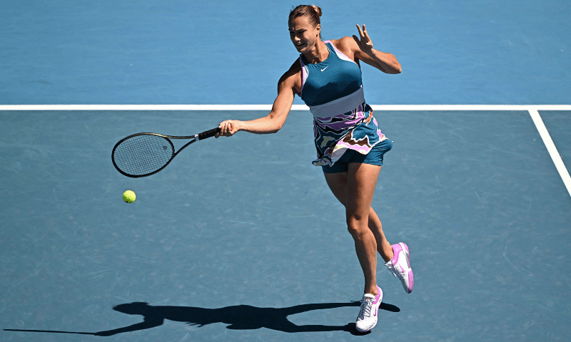  Belarus’ Aryna Sabalenka hits a return against Belgium’s Elise Mertens during their women’s singles match on day six of the Australian Open tennis tournament in Melbourne on Jan 21. — AFP