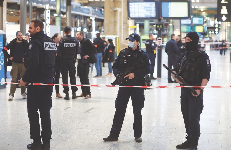 French police secure the Gare du Nord train station in Paris after taking into custody a man who stabbed several people on Wednesday.&mdash;Reuters
