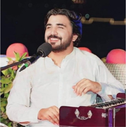 A YOUNG folk singer performs at the event. — Dawn