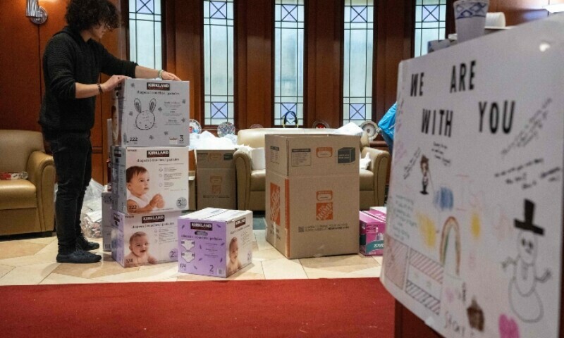  Volunteers prepare boxes of donations for people affected by the earthquake in Turkiye, at the Turkish Embassy in Washington, DC, on February 12. — AFP 