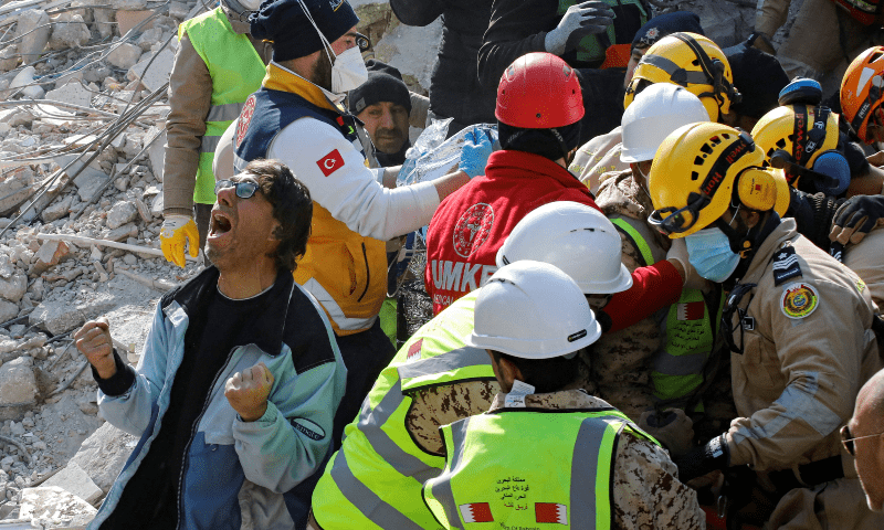 A son of a Turkish woman Saadet Sendag reacts as his mother is rescued after 177 hours, at the site of a collapsed building in the aftermath of a deadly earthquake in Hatay, Turkiye February 13. — Reuters