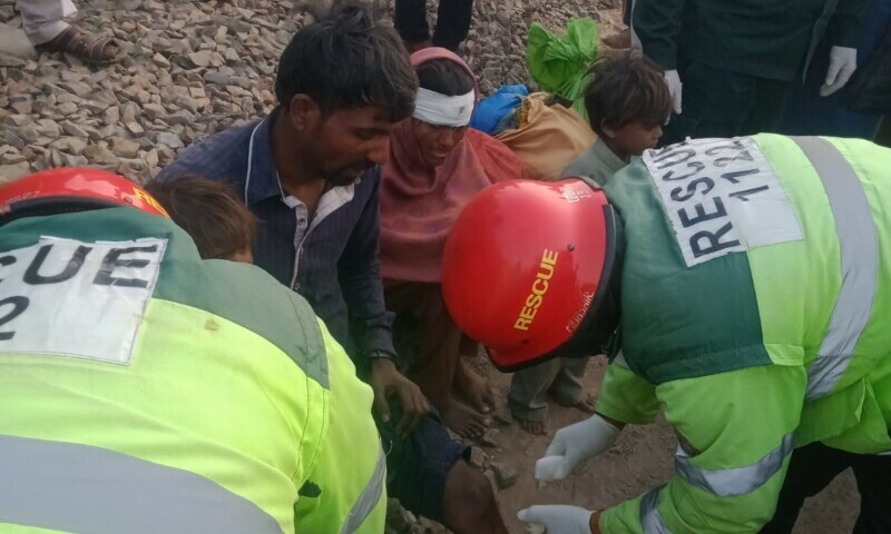 Rescue teams at the blast spot near Chichawatni on Thursday. — Photo by Ghalib Nihad