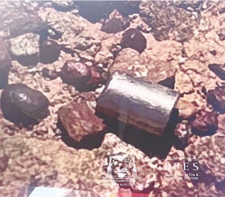   The radioactive capsule lies on the ground in this still image obtained from a handout video.—Reuters