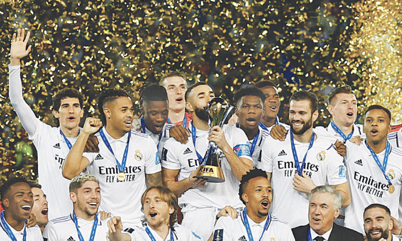 RABAT: Real Madrid players celebrate with the trophy after beating Al Hilal in the Club World Cup final at the Prince Moulay Abdellah Stadium.—Reuters RABAT: Real Madrid players celebrate with the trophy after beating Al Hilal in the Club World Cup final at the Prince Moulay Abdellah Stadium.—Reuters