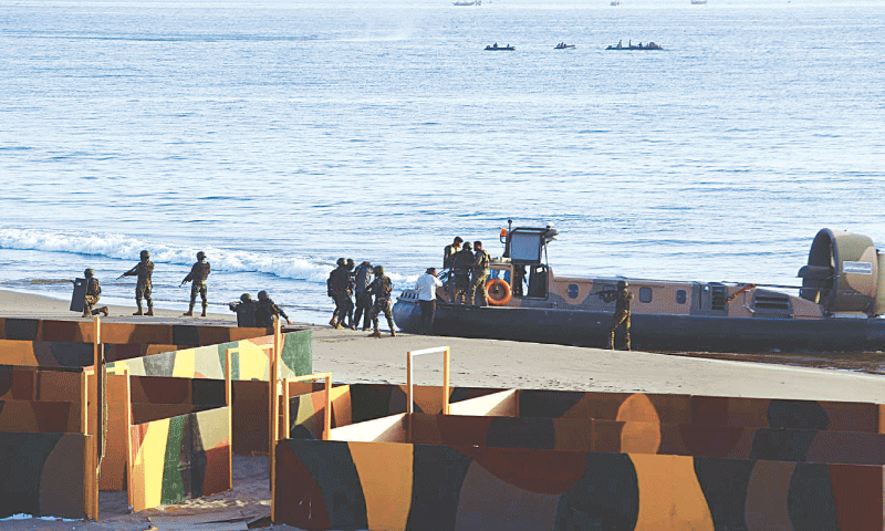 A hovercraft takes part in an assault drill at the multinational maritime exercise Aman-2023 in Karachi on Sunday.&mdash;PPI