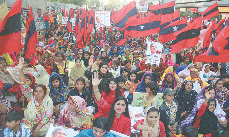 Activists of Awami Tehreek participate in a protest rally in front of the Karachi Press Club on Sunday.—Online Activists of Awami Tehreek participate in a protest rally in front of the Karachi Press Club on Sunday.—Online